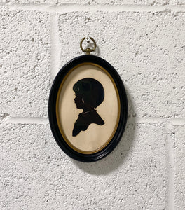 Vintage Silhouette of a Young Child