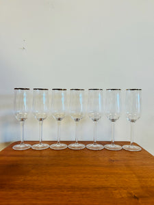 Set of Seven Gold Tip Champagne Flutes