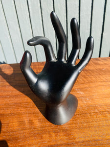 Black sculptural Hand