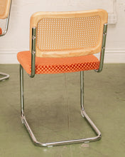 Load image into Gallery viewer, Checkered Rust Chrome Rattan Chair
