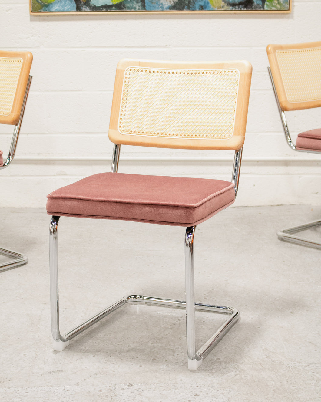 Dusty Rose Rattan and Chrome Chair