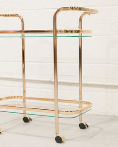 Wednesday brass and glass bar cart