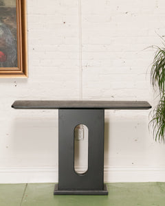 Black Console with Oval Base