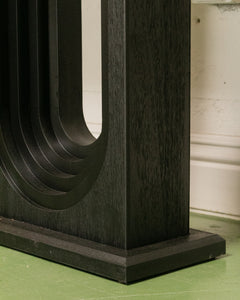 Black Console with Oval Base