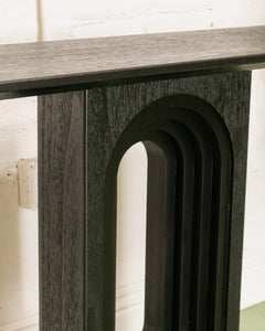 Black Console with Oval Base