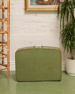 green vintage suitcase