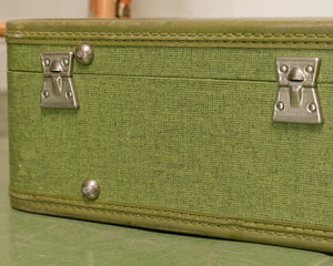 green vintage suitcase