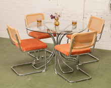 Load image into Gallery viewer, Checkered Rust Chrome Rattan Chair
