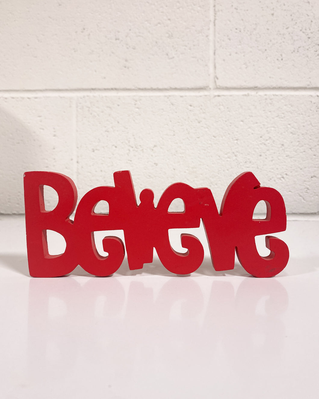 Wooden “Believe” Sign