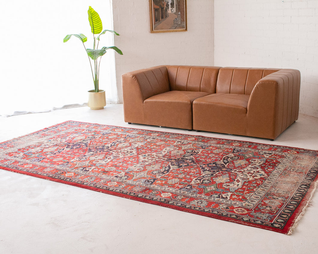 Distressed Antique Persian Rug